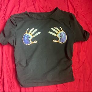 Fitted black crop top with handprint